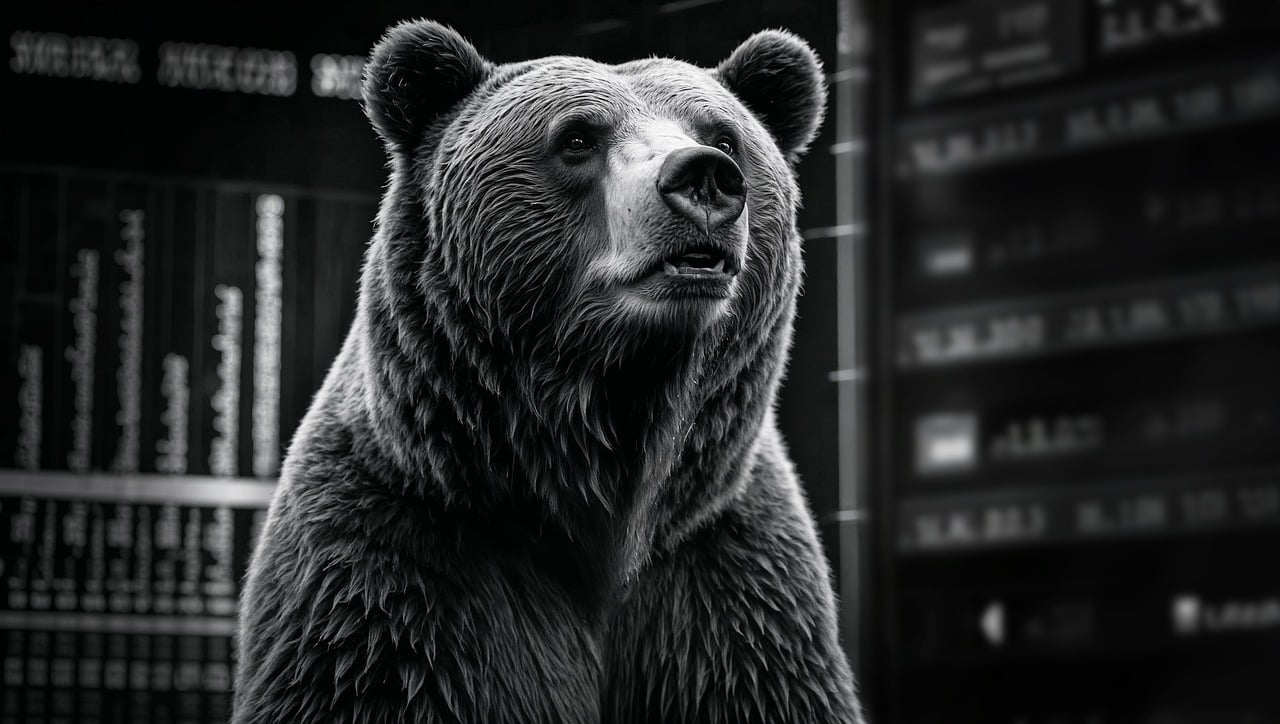 Black and white bear with blurred financial charts in the background, symbolizing market downturn and investment instability.